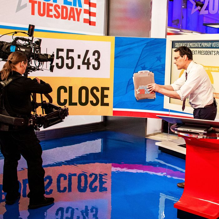 Steve Kornacki working on MSNBC's set during Super Tuesday election coverage.