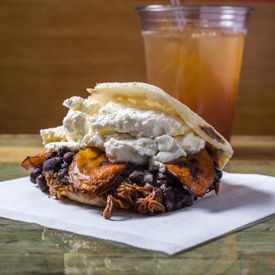 Pabellon arepa, with shredded beef, black beans, sweet plantains, and guayanés cheese.