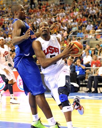 Kevin Durant #5 of the US Men's Senior National Team drives to the basket during a game against Serge Ibaka #14 of the Spanish Men's Senior National Team at Palau Sant Jordi on July 24, 2012