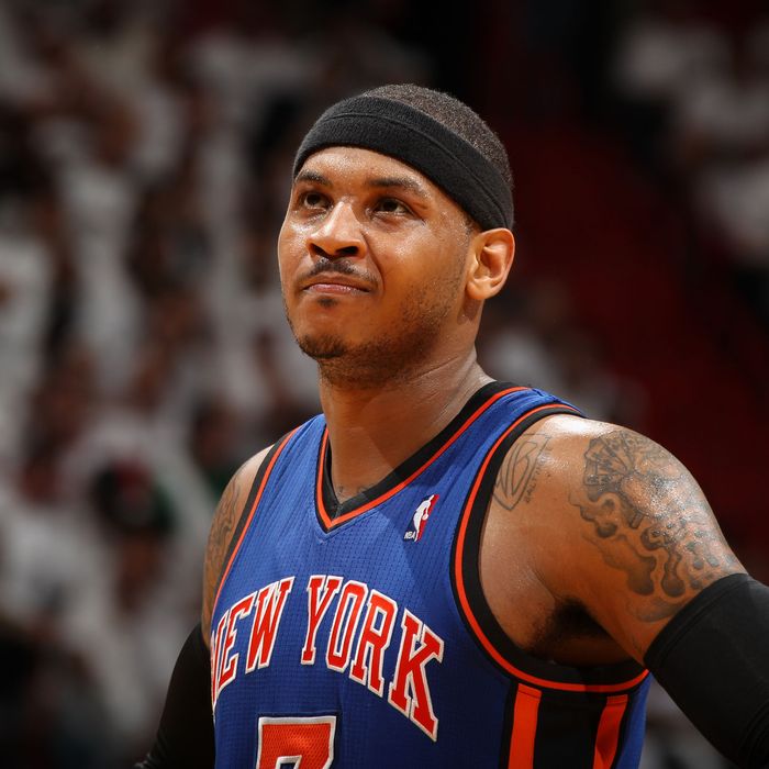Carmelo Anthony #7 of the New York Knicks looks at the crowd in Game Two of the Eastern Conference Quarterfinals against the Miami Heat during the 2012 NBA Playoffs on April 30, 2012 at American Airlines Arena in Miami, Florida.