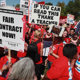 CHICAGO, IL - SEPTEMBER 15: Striking Chicago teachers and their supporters attend a rally at Union Park September 15, 2012 in Chicago, Illinois. An estimated 25,000 people gathered in the park in a show of solidarity as negotiations on a labor contract continue. Yesterday Chicago Teachers Union President Karen Lewis reported the 