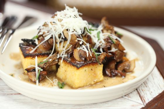 Semolina cake with wild mushrooms and pecorino.