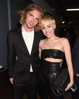 INGLEWOOD, CA - AUGUST 24: My Friend's Place representative Jesse (L) and recording artist Miley Cyrus attends the 2014 MTV Video Music Awards at The Forum on August 24, 2014 in Inglewood, California. (Photo by Jeff Kravitz/MTV1415/FilmMagic)