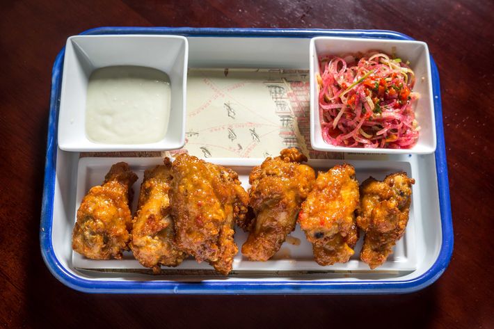 Thai chili chicken wings with blue cheese chili dressing.