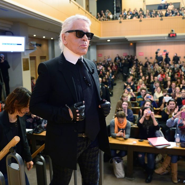 Lagerfeld unveils himself to an Instagram-happy class.
