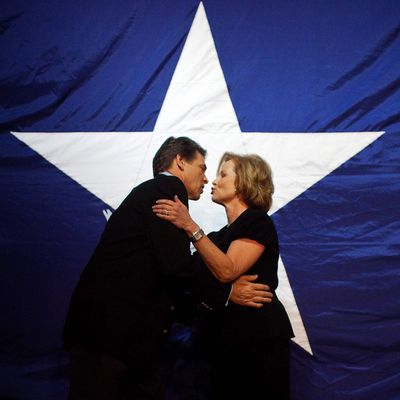 Texas Republican Gov. Rick Perry embraces his wife Anita at the Victory Texas and Republican Party of Texas election night watch party at the Texas Disposal Systems Exotic Game Ranch on November 2, 2010 in Buda, Texas. Gov. Perry has been elected to his third term by defeating Democratic challenger Bill White. 