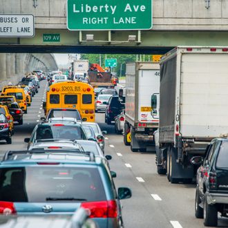 Traffic jam on three lanes on highway through Brooklyn