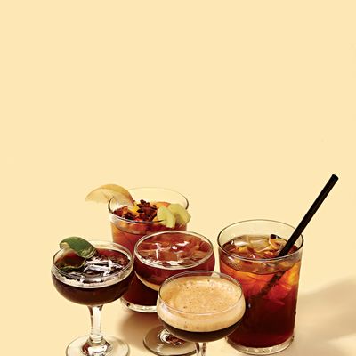 Iced espresso with mint and lime (far left); iced coffee with ginger, apple, and star anise (top); On the Rocks (center); caffè freddo (right); Shakerato (bottom).