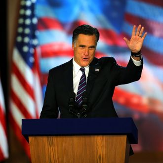 Republican presidential candidate, Mitt Romney, waves to the crowd while speaking at the podium as he concedes the presidency during Mitt Romney's campaign election night event at the Boston Convention & Exhibition Center on November 7, 2012 in Boston, Massachusetts. After voters went to the polls in the heavily contested presidential race, networks projected incumbent U.S. President Barack Obama has won re-election against Republican candidate, former Massachusetts Gov. Mitt Romney.