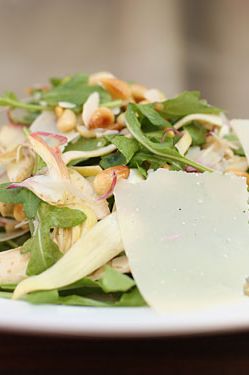 Thinly sliced raw artichokes with pine nuts and shaved Parmesan. $14