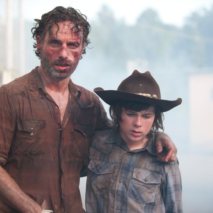 Rick Grimes (Andrew Lincoln) and Carl Grimes (Chandler Riggs) - The Walking Dead _ Season 4, Episode 8 - Photo Credit: Gene Page/AMC