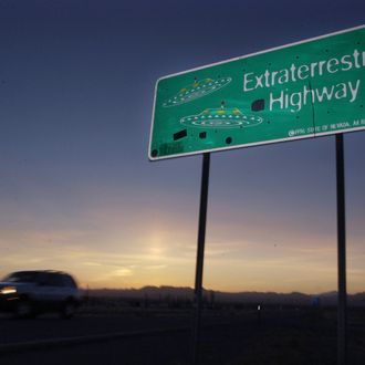 File - A car moves along the Extraterrestrial Highway near Rachel, Nevada, in this Wednesday, April 10, 2002 file photo. The ET highway was established by the Nevada Legislature in 1996 and runs along the eastern border of Area 51, a military base on the Nevada Test Site. George Washington University's National Security Archive obtained a CIA history of the U-2 spy plane program through a public records request and released it Thursday Aug. 15, 2013. (AP Laura Rauch, File)