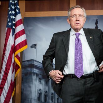  Senate Majority Leader Harry Reid (D-NV) listens during a news conference on Capitol Hill on June 21, 2012 in Washington, DC. The Democratic leadership addressed issues including the resignation of Commerce Secretary John Bryson and the expected Supreme Court ruling on the Affordable Care Act.