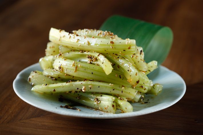 A snack of celery with kombu, sesame, shiso flakes, and sesame oil.