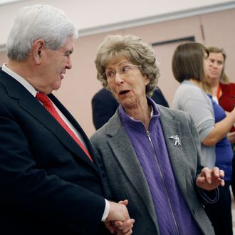 Republican presidential candidate and former Speaker of the House Newt Gingrich, left, talks with Jackie Provost, 86, right, during a campaign stop at the Newark Senior Center on April 11, 2012 in Newark, Delaware. This stop comes the day after former U.S. Sen. Rick Santorum suspended his campaign for the GOP nomination. 