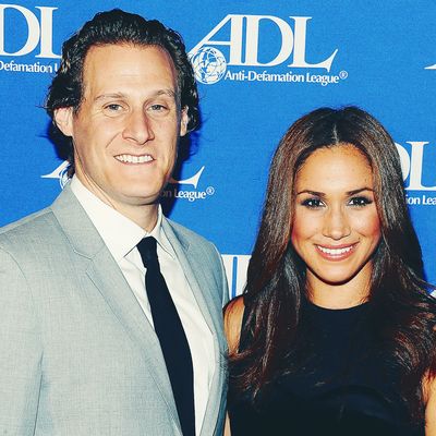 Trevor Engelson and Meghan Markle.