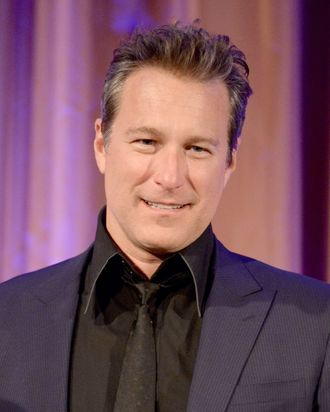 Actor John Corbett speaks onstage during the International Women's Media Foundation's 2013 Courage in Journalism Awards at the Beverly Hills Hotel on October 29, 2013 in Beverly Hills, California.