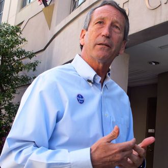 Former South Carolina Gov. Mark Sanford answers questions from reporters after voting in Charleston, S.C., on Tuesday, April 2, 2013. Sanford is facing former Charleston County councilman Curtis Bostic in the Republican runoff for South Carolina's vacant 1st District congressional seat. (AP Photo/Bruce Smith)