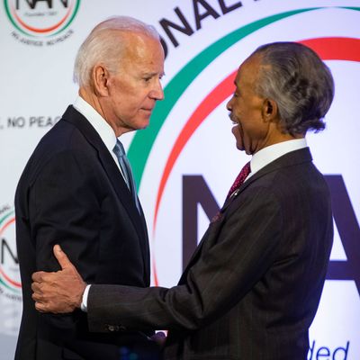 Former-Vice President Joe Biden greets the Reverend Al Sharpton.