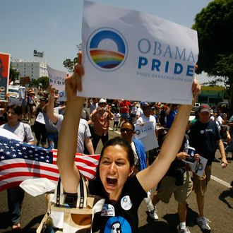 WEST HOLLYWOOD, CA - JUNE 08: Gay pride participants hold signs in support of Democratic presidential hopeful Barack Obama (D-IL) at the 38th annual LA Pride Parade June 8, 2008 in West Hollywood, California. California gay people are looking forward to the opportunity to legally marry, starting June 17. The California Supreme Court refused to stay its decision legalizing same-sex marriage though conservative and religious opponents called for the court to stop same-sex couples from marrying before their initiative to amend the state constitution to ban gay marriage goes to ballot in November. Some county clerks, including those of Kern, Merced, and Kings Counties, are reportedly threatening to refuse to perform all marriage ceremonies in opposition to the same-sex marriage decision. The parade is expected to draw more than 400,000 people. (Photo by David McNew/Getty Images)
