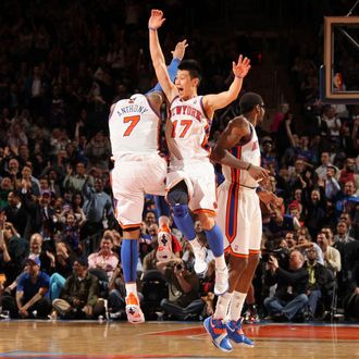 Jeremy Lin #17 and Carmelo Anthony #7 of the New York Knicks react to the game action during the fourth quarter against the Toronto Raptors on March 20, 2012 at Madison Square Garden in New York City.