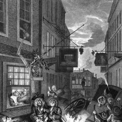 A busy London street at nighttime, 1738. The Salisbury Flying Coach lies overturned in the middle of the street, while homeless people huddle in a shelter and a figure in a window above empties a chamberpot over two passers-by. Engraved by W. Radclyffe from the original, 'Four Times of the Day - Night', by William Hogarth. 