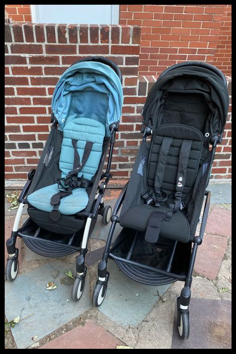 Photo of two versions of the Yoyo stroller side by side; on the left is the Yoyo 2 and on the right is the Yoyo 3.