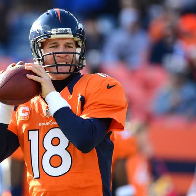 Peyton Manning #18 of the Denver Broncos warms up prior to the game against the Kansas City Chiefs at Sports Authority Field at Mile High on December 30, 2012 in Denver, Colorado.