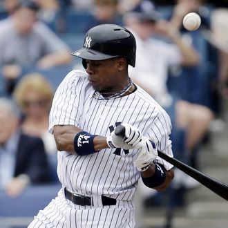 New York Yankees' Curtis Granderson is hit by a pitch from the Toronto Blue Jays' J.A. Happ during the first inning of a spring training exhibition baseball game, Sunday, Feb. 24, 2013, in Tampa, Fla. Granderson left the game after the play. (AP Photo/Matt Slocum)