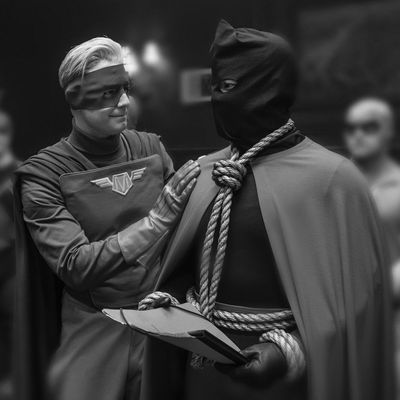 Captain Metropolis and Hooded Justice in Watchmen.