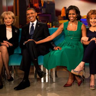 NEW YORK - SEPTEMBER 24: (AFP OUT) (L-R) Barbara Walters, U.S. President Barack Obama, first lady Michelle Obama and Joy Behar pose for a photo on the set of The View on ABC-TV September 24, 2012 in New York City. Obama is in New York to attend the United Nations General Assembly. (Photo by Allan Tannenbaum-Pool/Getty Images)