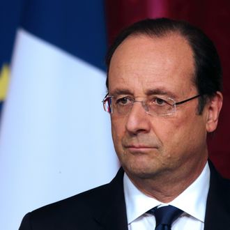 French President Francois Hollande pauses as he attends a news conference at the Elysee Palace in Paris, April 29, 2014. 