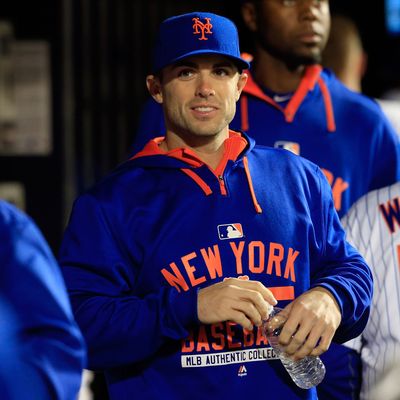 NEW YORK, NY - APRIL 21: David Wright #5 of the New York Mets looks on from the dugout against the Atlanta Braves during a game at Citi Field on April 21, 2015 in the Flushing neighborhood of the Queens borough of New York City. (Photo by Alex Trautwig/Getty Images)