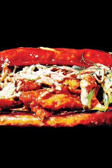 Boomwich’s Buffalo a la Chicken Sandwich $10; 311 Atlantic Ave., nr. Smith St., Boerum Hill 718-643-9229 Boneless chunks of fried chicken practically infused with Frank’s Red Hot sauce, a Neapolitan pizza’s worth of fresh mozzarella, carrot-celery slaw, and ranch dressing on a long pretzel roll. Someone has finally successfully crossed a chicken-parm hero with a basket of Buffalo wings.