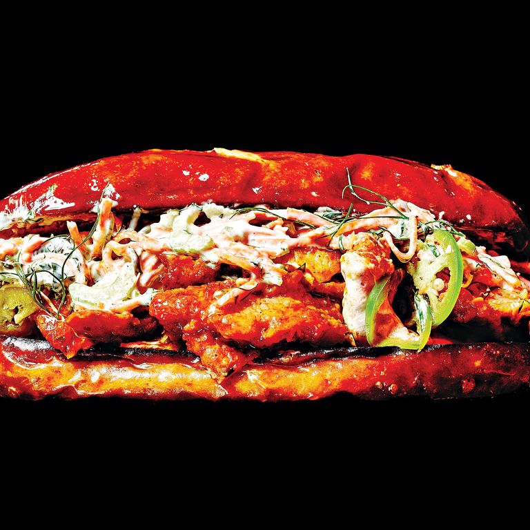 Boomwich’s Buffalo a la Chicken Sandwich  $10; 311 Atlantic Ave., nr. Smith St., Boerum Hill 718-643-9229  Boneless chunks of fried chicken practically infused with Frank’s Red Hot sauce, a Neapolitan pizza’s worth of fresh mozzarella, carrot-celery slaw, and ranch dressing on a long pretzel roll. Someone has finally successfully crossed a chicken-parm hero with a basket of Buffalo wings.
