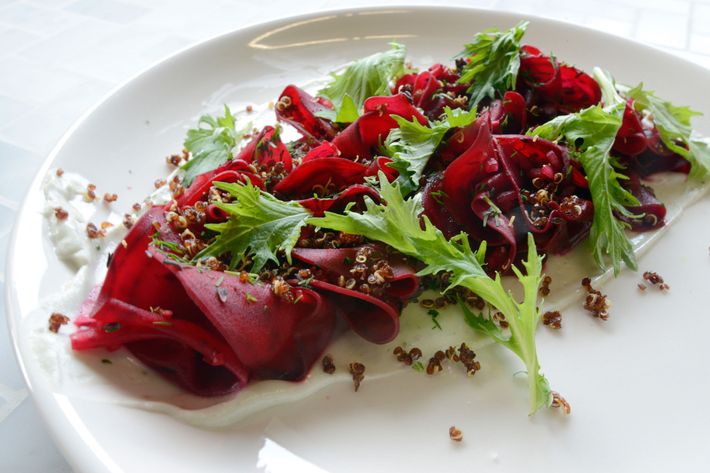 Shaved beets, blue cheese, and crispy quinoa.