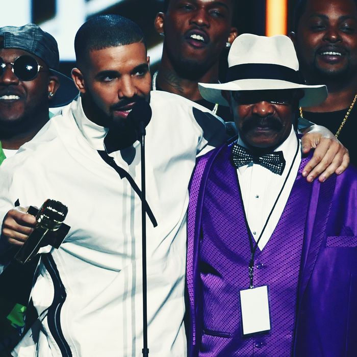 Drake and his father, Dennis Graham.