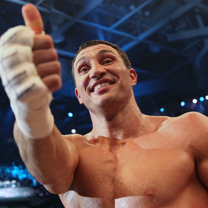 Ukrainian Heavyweight Champion Wladimir Klitschko gestures as he celebrates his win against challenger Italian-born Francesco Pianeta by knockout in round 6 in their IBO, IBF, WBO, WBA title fight in Mannheim, Germany on May 4, 2013. 