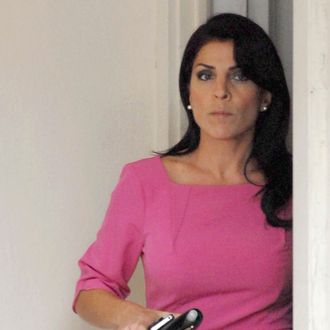 TAMPA, FL - NOVEMBER 13: Jill Kelley leaves her home on November 13, 2012 in Tampa, Florida. Kelley, who is reported to be involved with the military community at MacDill Air Force Base, reported receiving harassing emails to the FBI, which resulted in an investigation that revealed the sender to be Paula Broadwell, who was found to be having an affair with Gen. David H. Petraeus. (Photo by Tim Boyles/Getty Images)