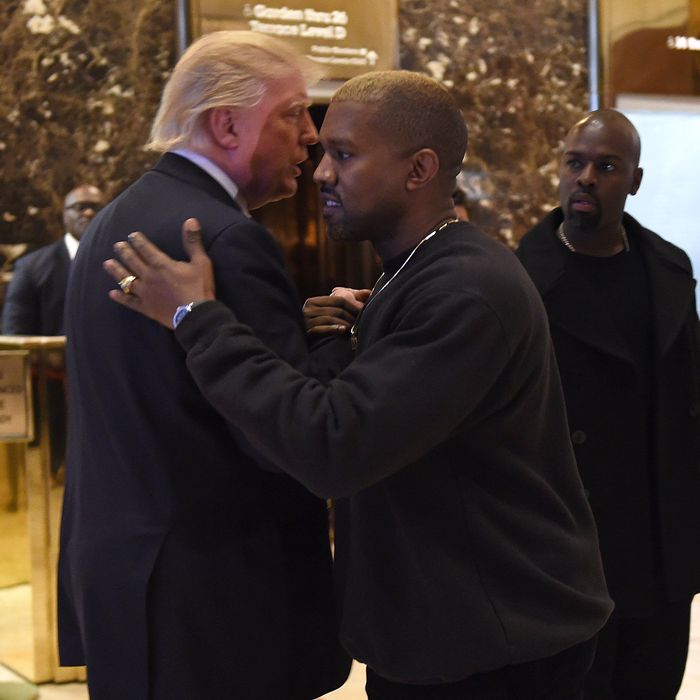 Singer Kanye West and President-elect Donald Trump talk at Trump Tower after meetings on December 13, 2016 in New York.