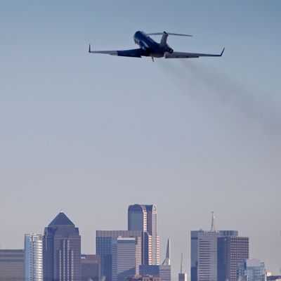 DALLAS, TX - OCTOBER 15: An air ambulance carrying Amber Vinson takes off from Love Field Airport October 15, 2014. According to reports, Vinson, a healthcare worker, had contracted the Ebola virus and had taken a commercial Frontier Airlines flight from Cleveland, Ohio to Dallas, Texas, a day before become symptomatic. (Photo by Stewart F. House/Getty Images)