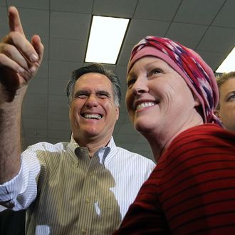 CLEVELAND, OH - MARCH 02: Republican presidential candidate and former Massachusetts Gov. Mitt Romney greets supporters during a campaign rally at Cleveland State University's Cole Center on March 2, 2012 in Cleveland, Ohio. After winning the Michigan and Arizona primaries, Mitt Romney is campaigning in Washington and Ohio ahead of the Super Tuesday primaries MArch 6. (Photo by Justin Sullivan/Getty Images)