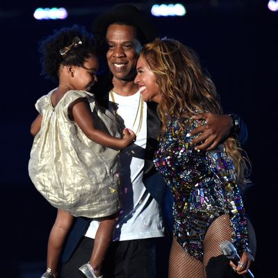 INGLEWOOD, CA - AUGUST 24: Blue Ivy Carter, Jay-Z and Beyonce onstage during the 2014 MTV Video Music Awards at The Forum on August 24, 2014 in Inglewood, California. (Photo by Kevin Mazur/MTV1415/WireImage)