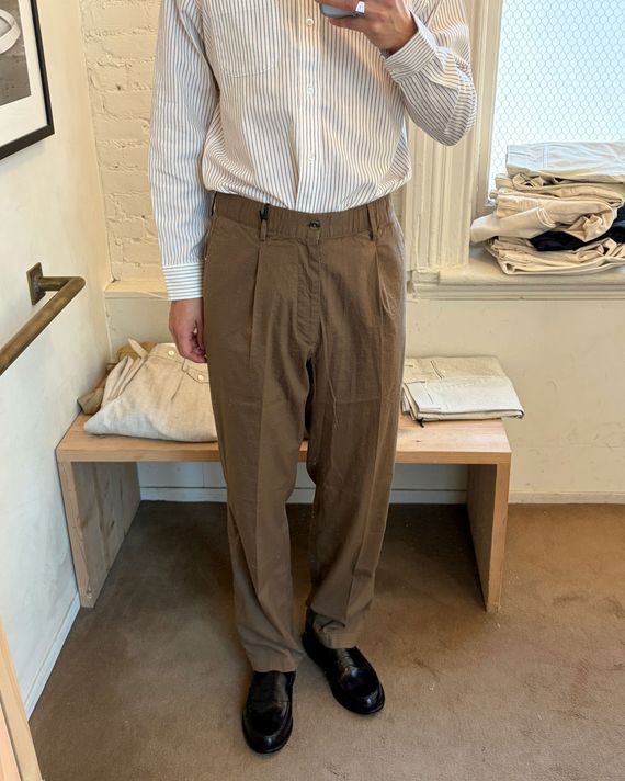 Man in brown pants.