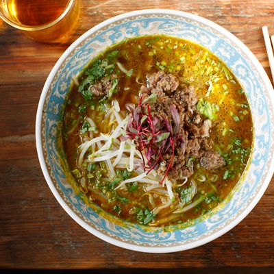 Curry-spiced ramen with chicken and seafood broth, minced beef, and bean sprouts.