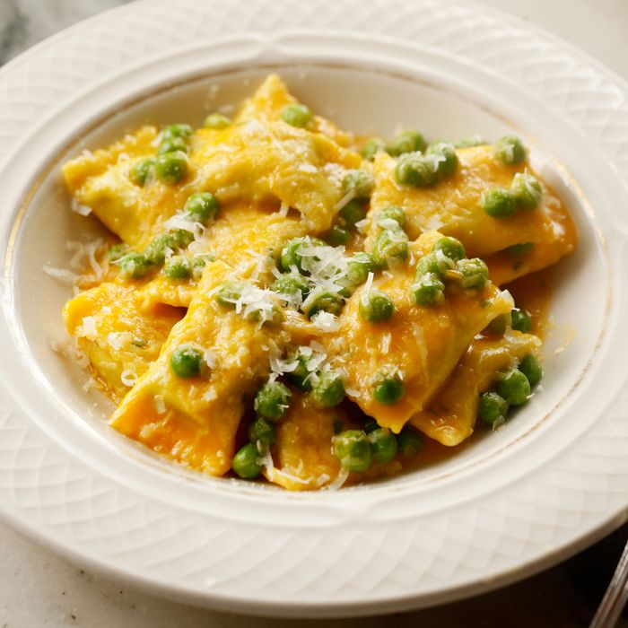 Agnolotti with sweet peas, carrots, and Parmesan.