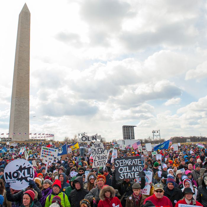 Feb. 17, 2013 - Washington, District of Columbia, U.S. - Tens of thousands march on the National Mall and past the White House to urge President Obama to reject the Keystone XL pipeline and to show leadership on other climate change issues. (Credit Image: ? Jay Mallin/ZUMAPRESS.com)