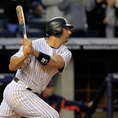 NEW YORK, NY - OCTOBER 02: Jorge Posada #20 of the New York Yankees hits a triple in the ninth inning against the Detroit Tigers during Game Two of the American League Division Series at Yankee Stadium on October 2, 2011 in New York City. (Photo by Chris Trotman/Getty Images)