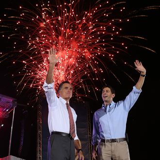 FISHERSVILLE, VA - OCTOBER 04: Republican presidential candidate, former Massachusetts Gov. Mitt Romney (L) and his running mate Rep Paul Ryan (R-WI) wave to supporters during a campaign rally at the Augusta Expoland on October 4, 2012 in Fishersville, Virginia. One day after the first Presidential debate, Mitt Romney spoke to the CPAC before heading to Virginia to campaign with his running mate Rep Paul Ryan (R-WI). (Photo by Justin Sullivan/Getty Images)