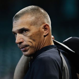  Manager Joe Girardi #28 of the New York Yankees waits on the field before the game against the Houston Astros at Minute Maid Park on September 27, 2013 in Houston, Texas.